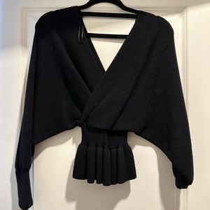 Black v-neck sweater in size medium